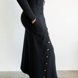 Lai High Waist Asymmetrical Button Skirt in Black with Gold Buttons