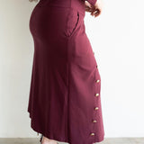 Lai High Waist Asymmetrical Button Skirt in Maroon with Gold Buttons