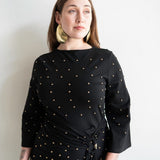 The Perfect Elevated T-Shirt with Draping in Black with Gold Beads