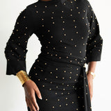 The Perfect Elevated T-Shirt with Draping in Black with Gold Beads