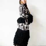 Wura High Neck Long Sleeve Tassel Knit Top in Black and White Print