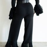 Ore Super High Waisted Belted Wide Leg Knit Tassel Fringe Pants in Black