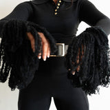 Ore Long Sleeve Knit Tassel Fringe Top in Black