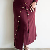 Lai High Waist Asymmetrical Button Skirt in Maroon with Gold Buttons